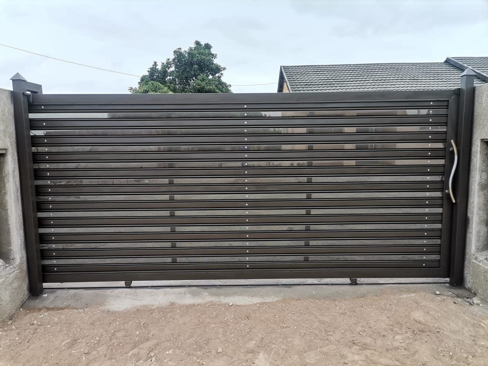 Pedestrian perforated slats gate